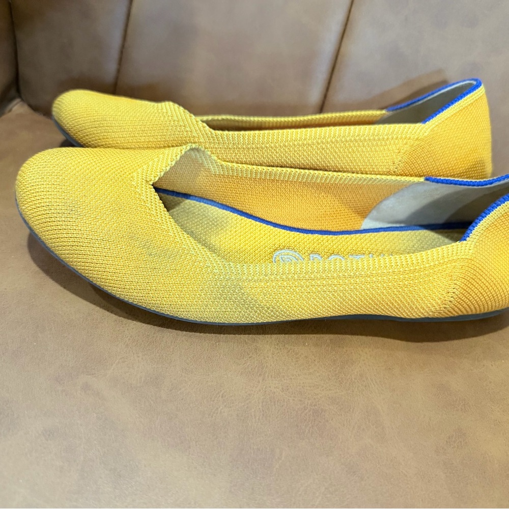 Rothy's Bright Yellow Flats with Blue Trim